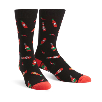 black crew socks for men with red chili pepper and hot sauce bottle pattern.  