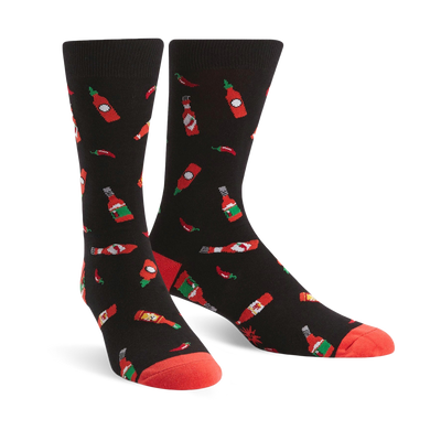 black crew socks for men with red chili pepper and hot sauce bottle pattern.  