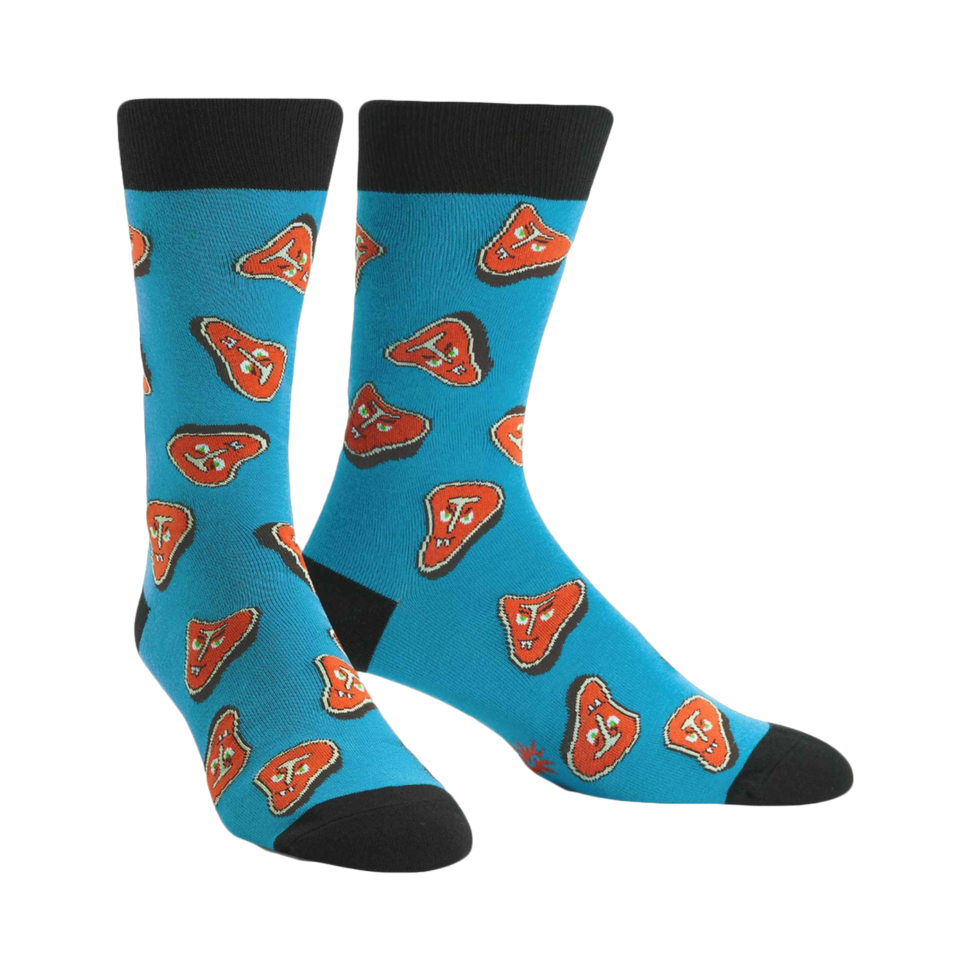 Pair of teal crew socks featuring a pattern of cartoonish orange steaks. Black cuffs and toes.