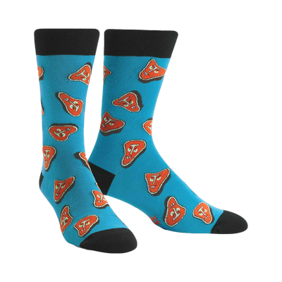 Pair of teal crew socks featuring a pattern of cartoonish orange steaks. Black cuffs and toes.