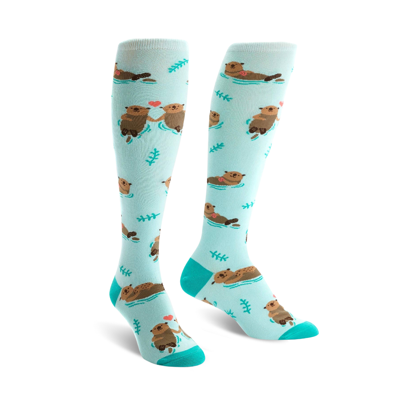 Pair of teal knee-high socks with a pattern of brown otters holding hands and small hearts.  Simple leaf designs are also scattered on the socks.