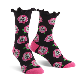 black crew socks with a pattern of pink roses, green leaves and white cat faces. ruffled pink edge at top.   