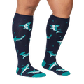 Lifestyle shot showing the Shark Attack knee-high socks on a person's legs.  The socks are in focus and look comfortable.