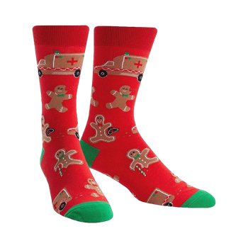 A pair of red crew socks with a fun Christmas design.  The socks feature gingerbread men, ambulances, and candy canes.