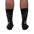 Back view of a person wearing Wizard Lizard socks, showing the full design on the back of the socks.