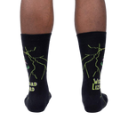 Back view of a person wearing Wizard Lizard socks, showing the full design on the back of the socks.