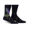 Crew socks in black with a whimsical design of a purple lizard wizard casting a spell amidst green lightning bolts. Text reads 'Wizard Lizard'.