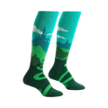Pair of teal and green knee-high socks depicting a whimsical landscape with a castle, winding road, and a moose.