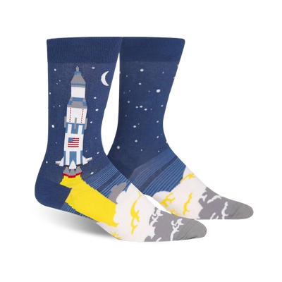 blue crew socks designed for men featuring a cartoon rocket launching into space against a starry night sky.  