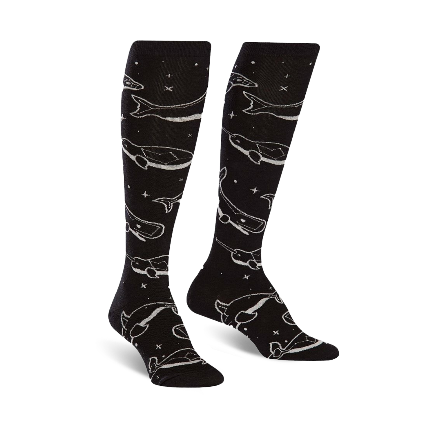Pair of black knee-high socks with a repeating pattern of light grey whales and stars. The socks glow in the dark.