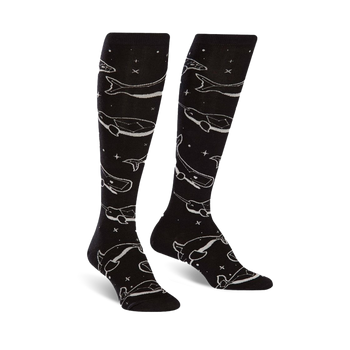 black knee-high socks with white stars and gray & white whale pattern; glows in the dark.   