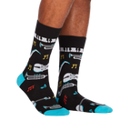 Lifestyle shot showing 'All That Jazz' socks on a person's legs, highlighting the fit and design in a real-world setting.