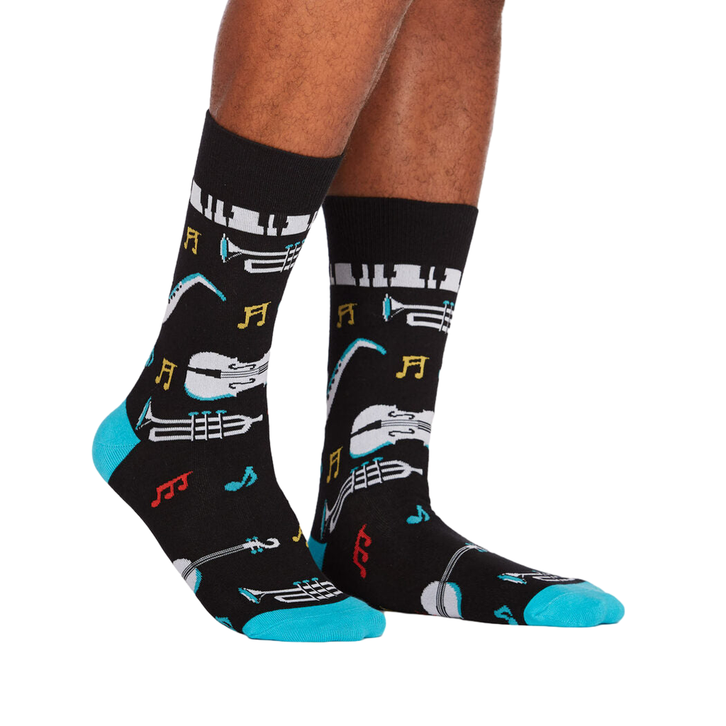Lifestyle shot showing 'All That Jazz' socks on a person's legs, highlighting the fit and design in a real-world setting.