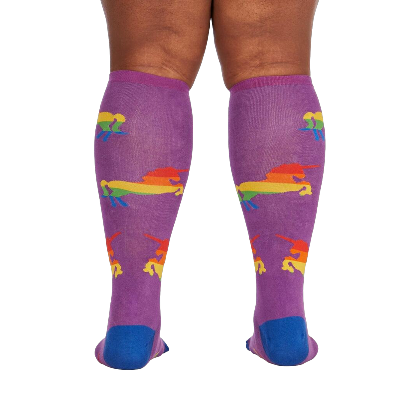 Back view of the socks on a person's legs; showcases the sock's full design and fit.