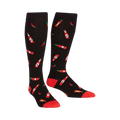 Pair of black knee-high socks with a pattern of red hot sauce bottles and chili peppers.  The socks have red cuffs.