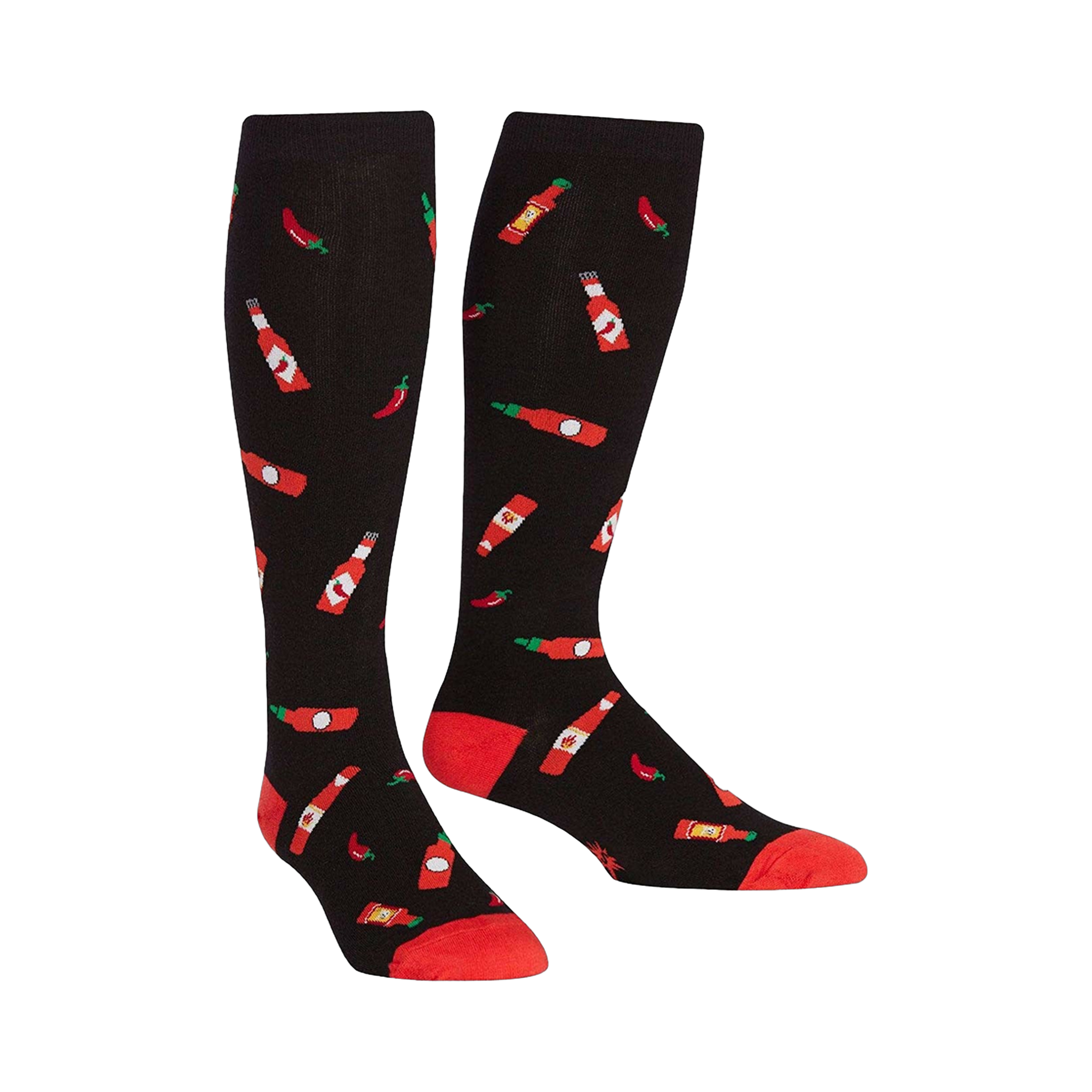 Pair of black knee-high socks with a pattern of red hot sauce bottles and chili peppers.  The socks have red cuffs.