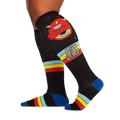 Lifestyle shot of a person wearing the 'Stay Weird!' knee-high socks, showcasing the socks' design and fit.