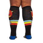 Back view of the 'Stay Weird!' knee-high socks, highlighting the full design and color details on the back.