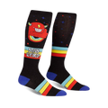 Pair of black knee-high socks with a red monster, rainbow, and retro stripes. Text reads 'Stay Weird!'