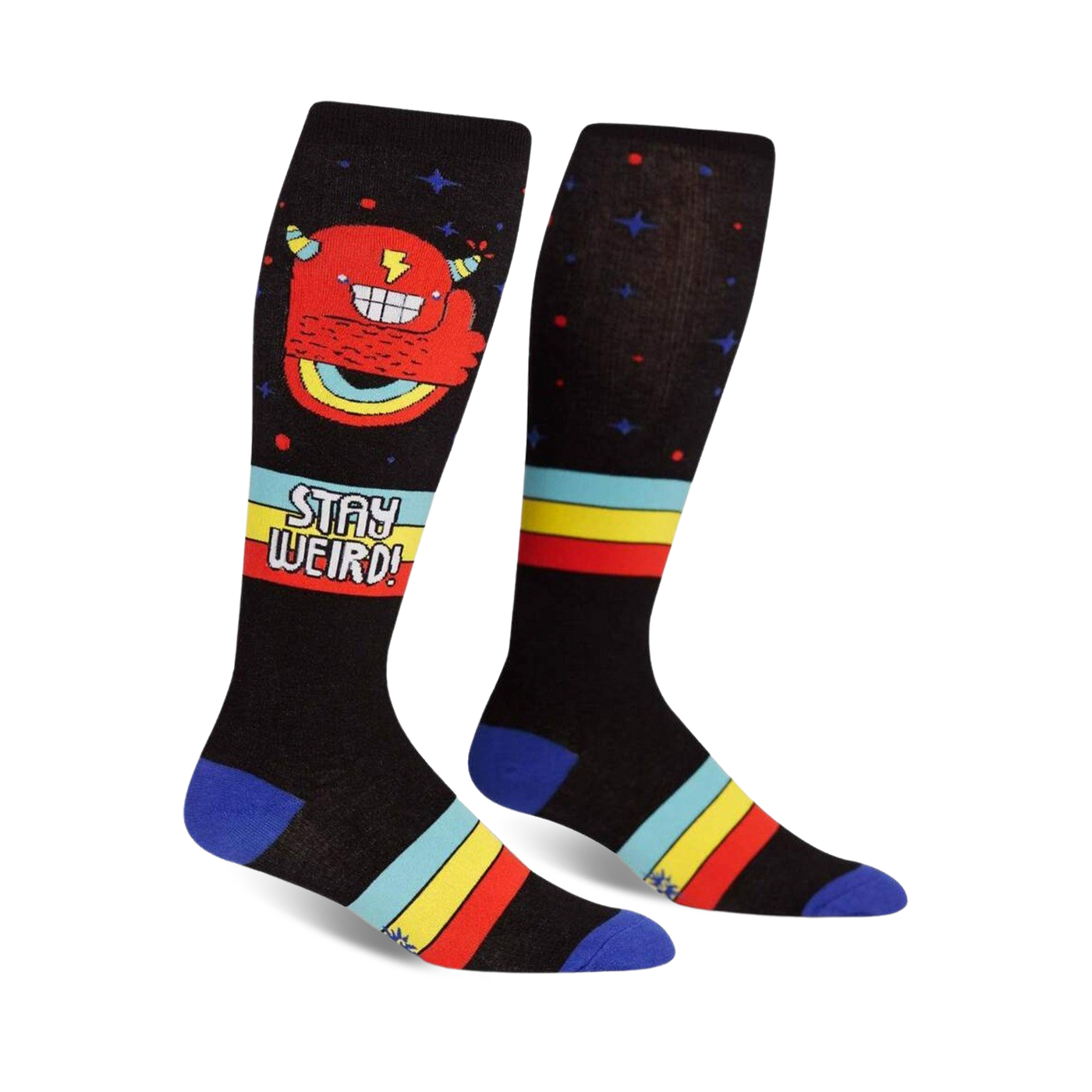 Pair of black knee-high socks with a red monster, rainbow, and retro stripes. Text reads 'Stay Weird!'