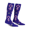 Pair of purple knee-high socks.  The socks are adorned with pink and white floral Venus symbols on a rich purple background.