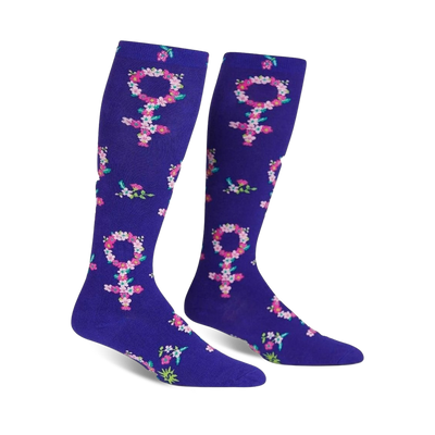 knee-high wide calf purple socks with pink, yellow, and white flowers shaped as the female gender symbol.  