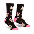 Pair of black crew socks with a fun pattern of pugs wearing unicorn horns and wings. Pink accents on the cuffs and small pink bone details.