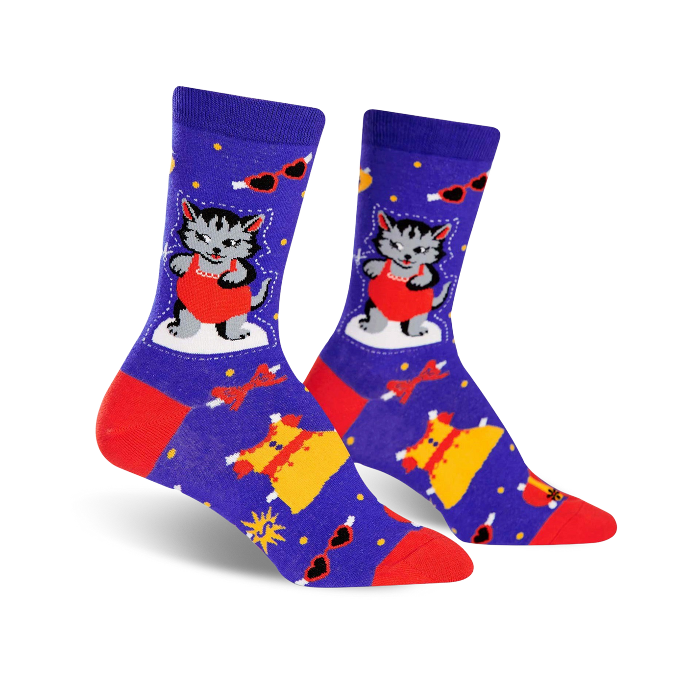 A pair of women's crew socks in purple, red, and yellow. The design features a cute cat in a red dress and other dress-themed elements.