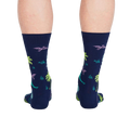 Rear view of the socks on a person's feet, highlighting the full design.