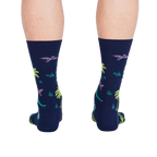 Rear view of the socks on a person's feet, highlighting the full design.