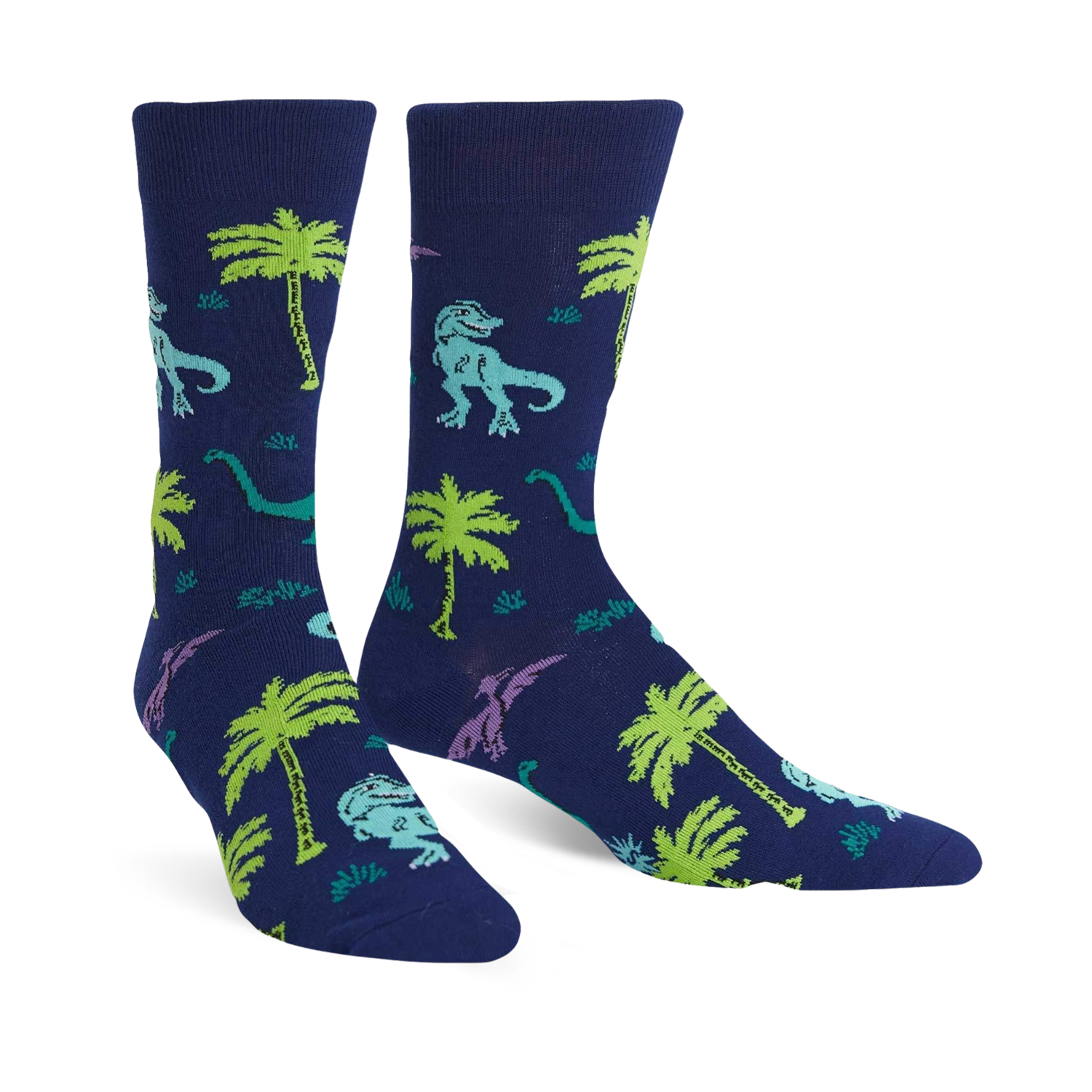 Pair of navy blue crew socks featuring a fun pattern of green and purple dinosaurs and palm trees.