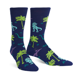 mens blue crew socks featuring green, purple, and blue dinosaurs frolicking amidst palm trees.  