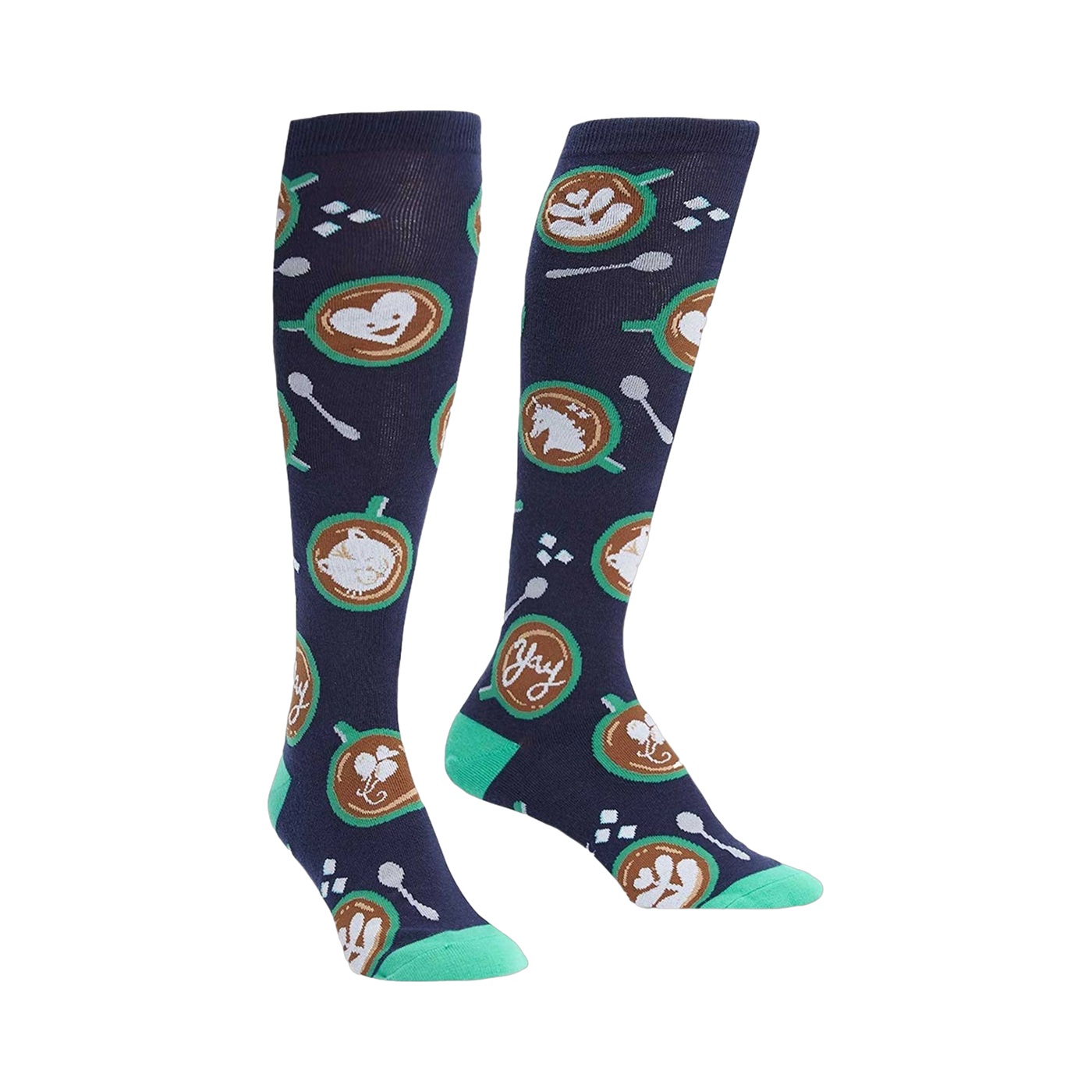 Pair of navy blue knee-high socks with latte art (hearts, horses, cats), teal spoons, and sugar cubes.
