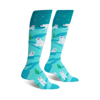 blue knee-high socks with white polar bears, evergreen trees, and snowflakes.  