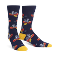 Crew socks in navy blue, featuring a repeating pattern of gray squirrels paddling red canoes. Yellow cuffs add a pop of color.