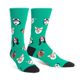 Crew socks in teal with an all-over print of dogs' faces.  The dogs are pugs, huskies, and corgis with a rock and roll theme.