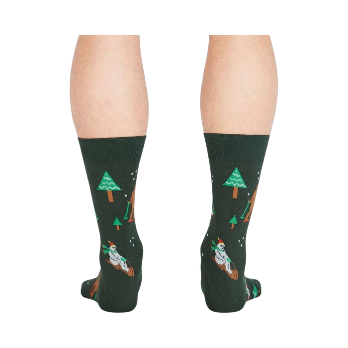 Rear view of the 'Ready, Yeti, Go!' socks showcasing the full design detail on a dark green background. 