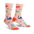 Crew socks in pink featuring colorful dinosaurs, balloons, and party hats. Fun, playful design.