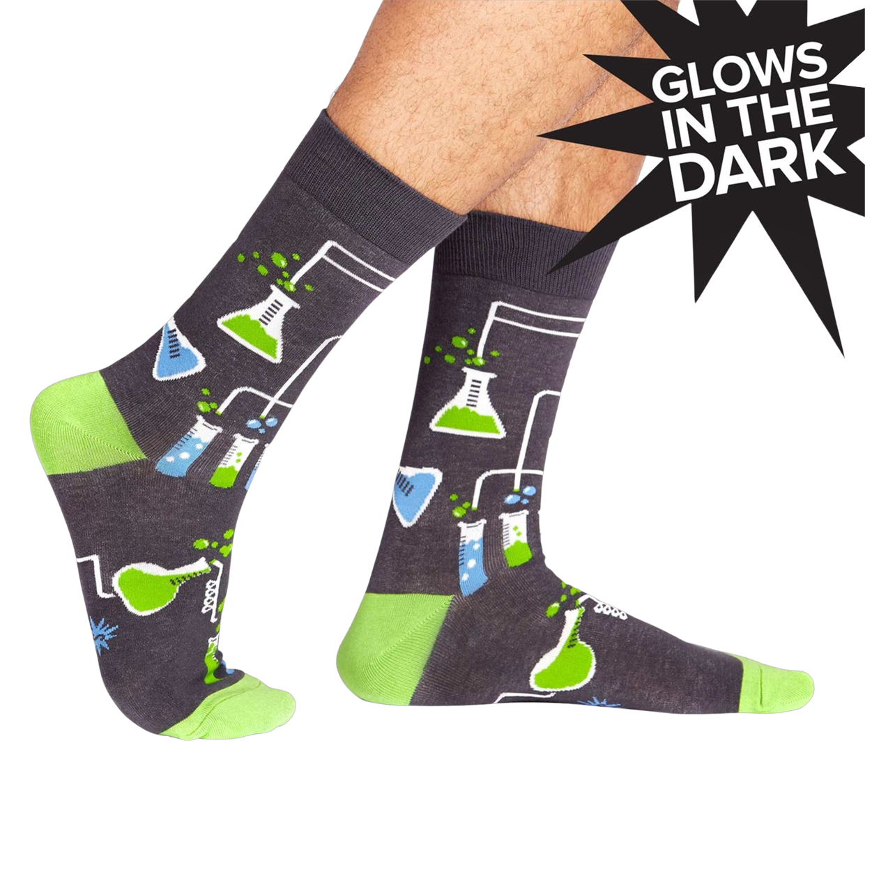Crew socks in dark gray with a fun science design featuring beakers, flasks, and lime green accents.  They glow in the dark!