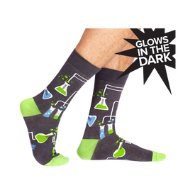 dark gray crew socks for men with a pattern of beakers and test tubes filled with different colored liquids. perfect for chemistry lovers.  