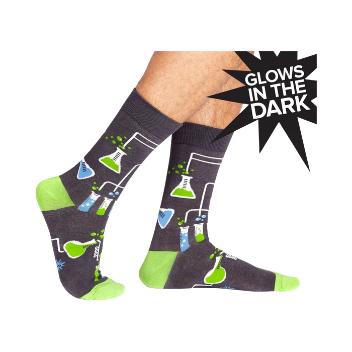 dark gray crew socks for men with a pattern of beakers and test tubes filled with different colored liquids. perfect for chemistry lovers.  