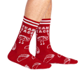 Lifestyle shot of a person wearing the red 'Team Taco' crew socks.