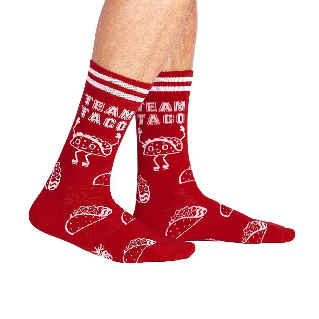Lifestyle shot of a person wearing the red 'Team Taco' crew socks.