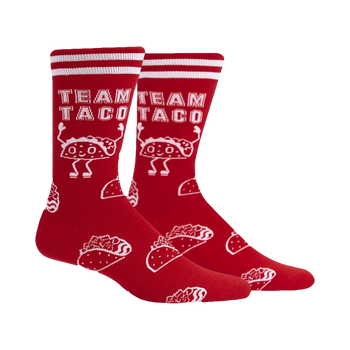 Pair of red crew socks with white stripes and a repeating pattern of cartoon tacos and the text 'Team Taco'.