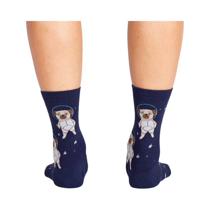 Back view of the socks on a person's legs, highlighting the full astronaut pug design on the back of the socks.