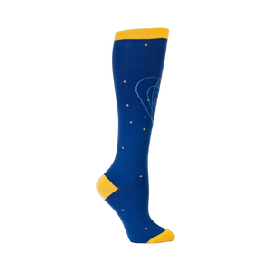 Close-up side view of a single blue knee-high sock with a yellow cuff and orbiting planet design.