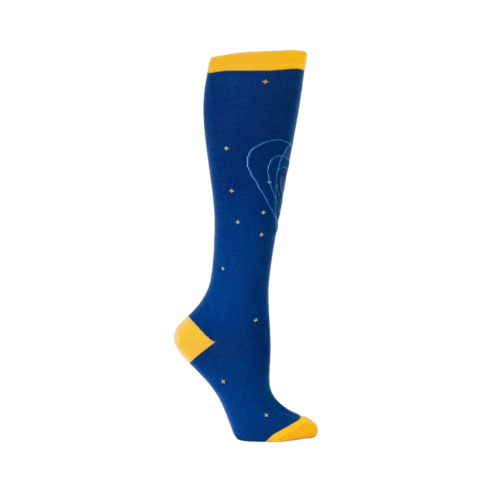 Close-up side view of a single blue knee-high sock with a yellow cuff and orbiting planet design.