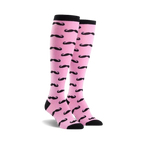Pair of pink knee-high socks with a repeating black mustache pattern.  Black cuffs.