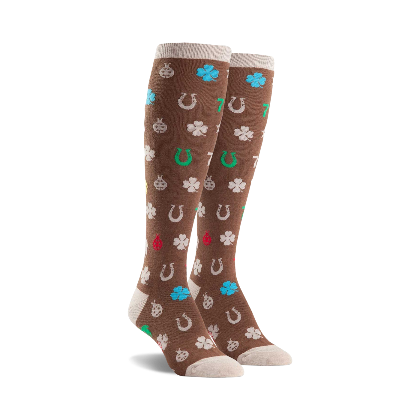Pair of brown knee-high socks featuring a pattern of four-leaf clovers, horseshoes, ladybugs, and the number seven in various colors.