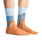 Lifestyle shot of a person wearing the Squid-O socks, showing how the socks look when worn.